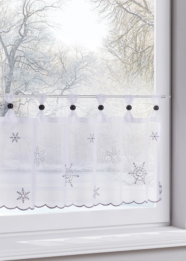 Brise-bise avec broderie hivernale