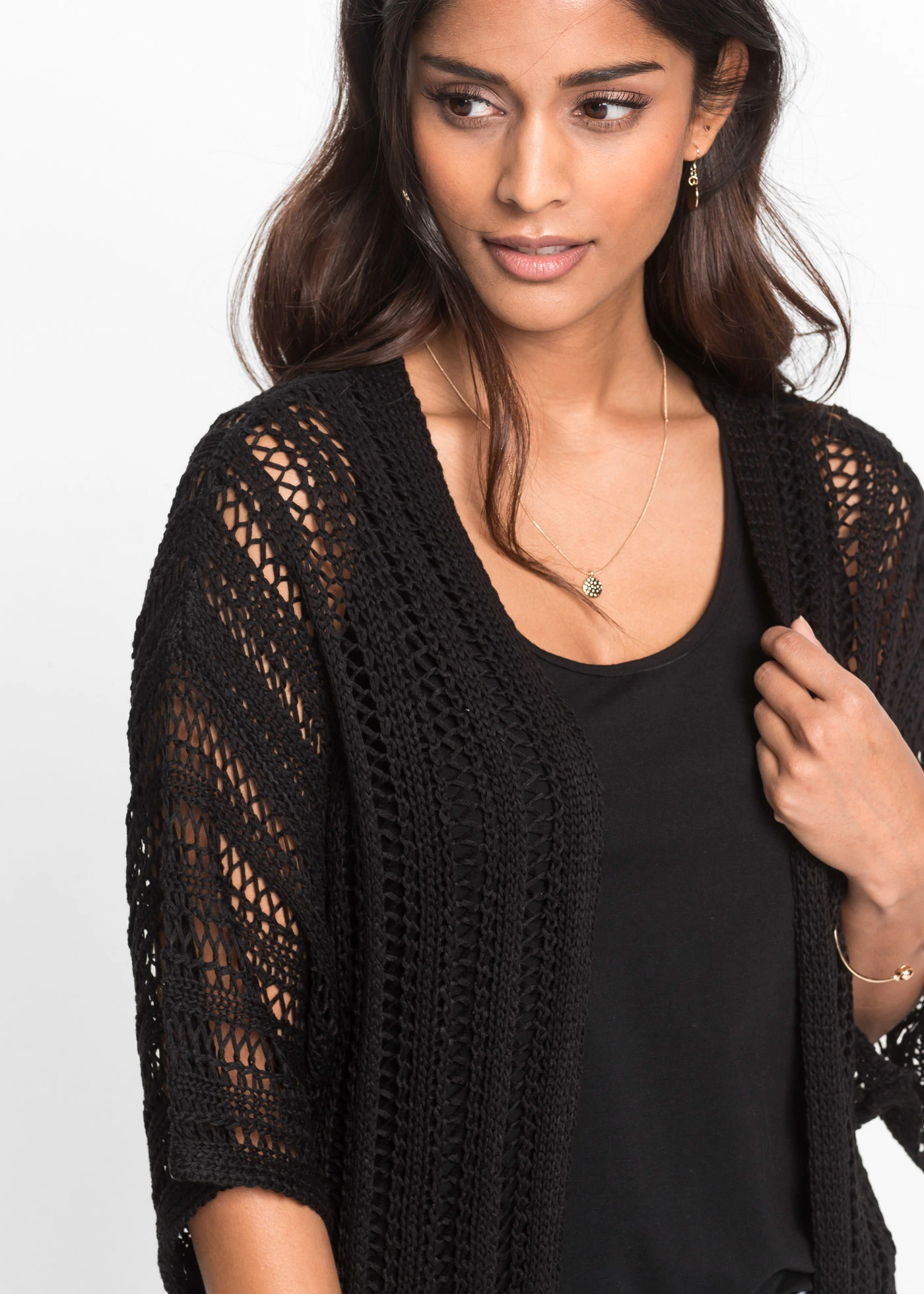 Dlouhý pletený kabátek s dírkovaným vzorem • černá • bonprix obchod