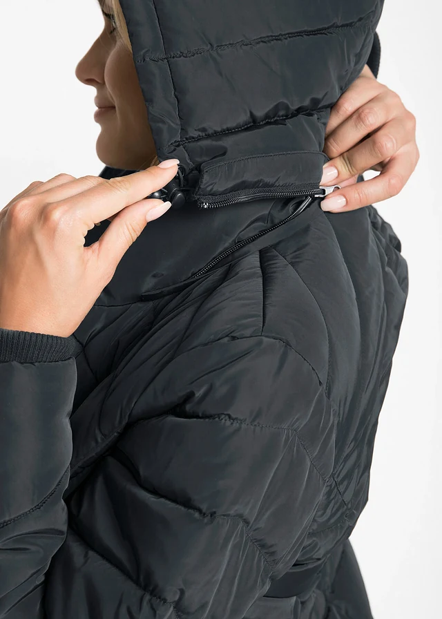 Veste longue matelassée, rembourrée • noir • product-page.page-title-suffix
