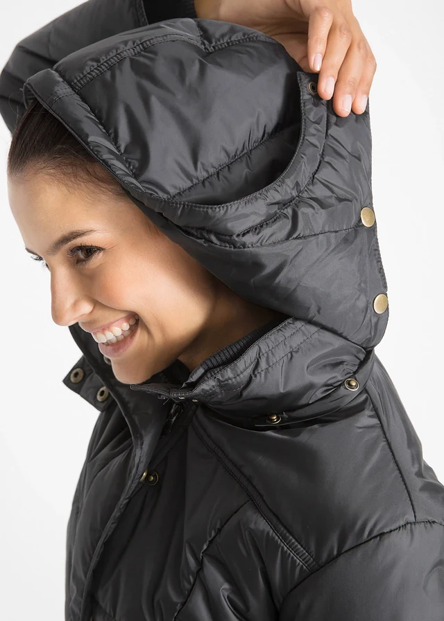 Lange gewatteerde jas met kraag en capuchon • zwart • product-page.page-title-suffix