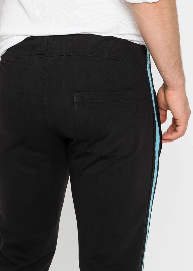 Joggingbroek met contrasterende strepen • zwart • product-page.page-title-suffix