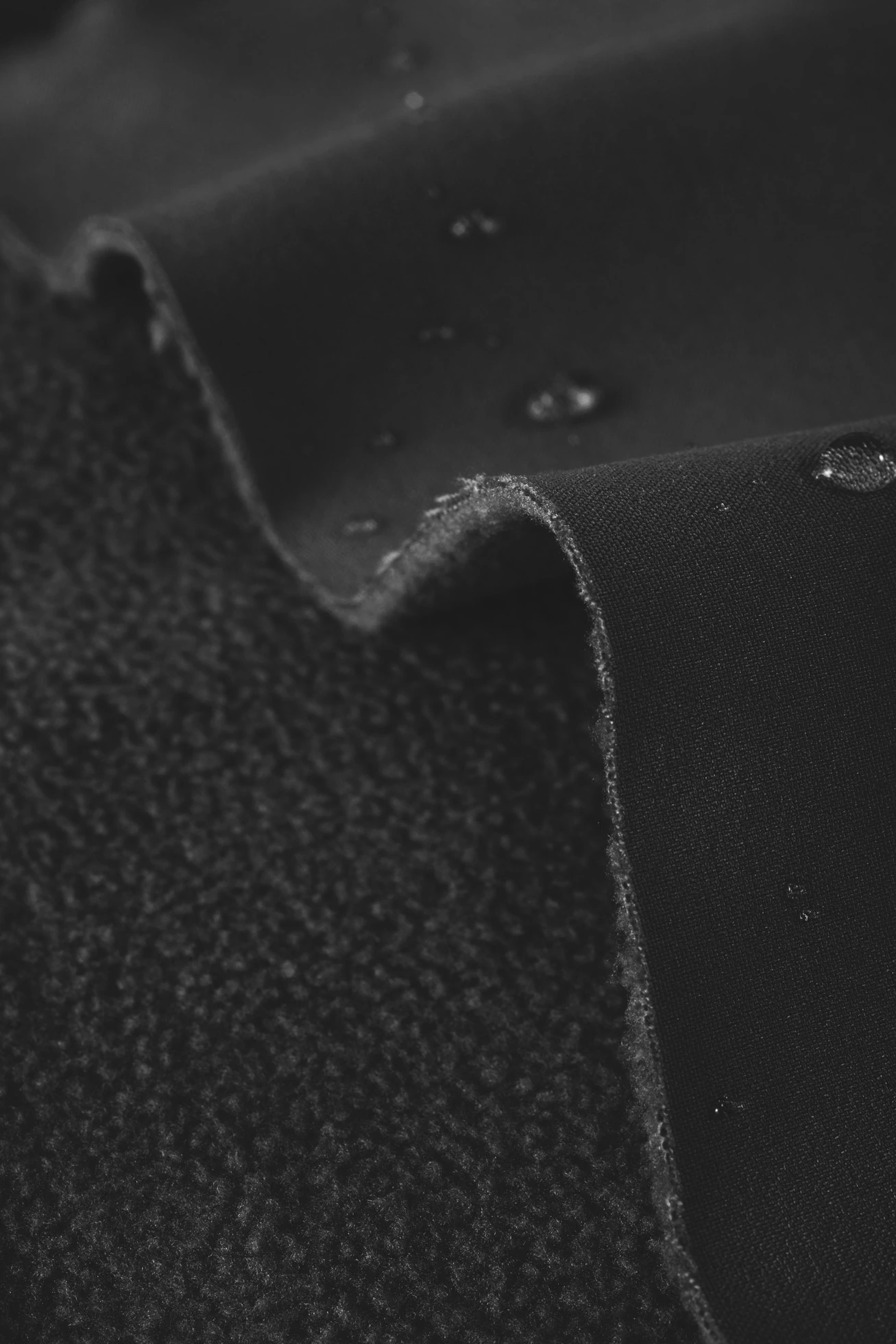 Lange softshell jas in layerlook, waterafstotend • zwart • bonprix online shop