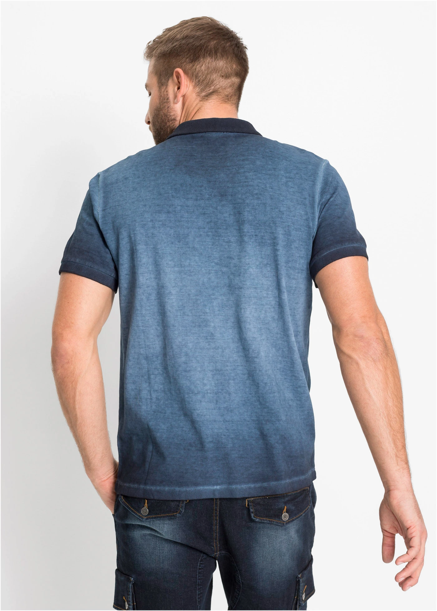 Polo en maille piquée à l’aspect délavé • bleu profond used • Boutique bonprix