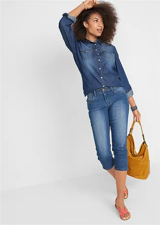 Jeansy slim fit, cropped, średni stan • niebieski "used" • sklep bonprix
