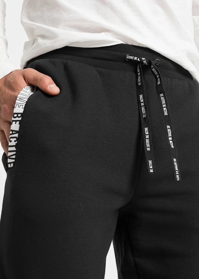 Pantalon de jogging avec détails sportifs • noir • product-page.page-title-suffix