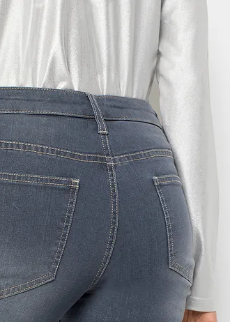 Jeansy skinny z niskim stanem, z nadrukiem gwiazdek • niebiesko-szary denim z nadrukiem • sklep bonprix