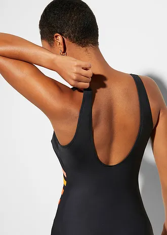 Stahovací jednodílné plavky, silný tvarující efekt, se vsadkami • černá - oranžová příčně pruhované • bonprix obchod