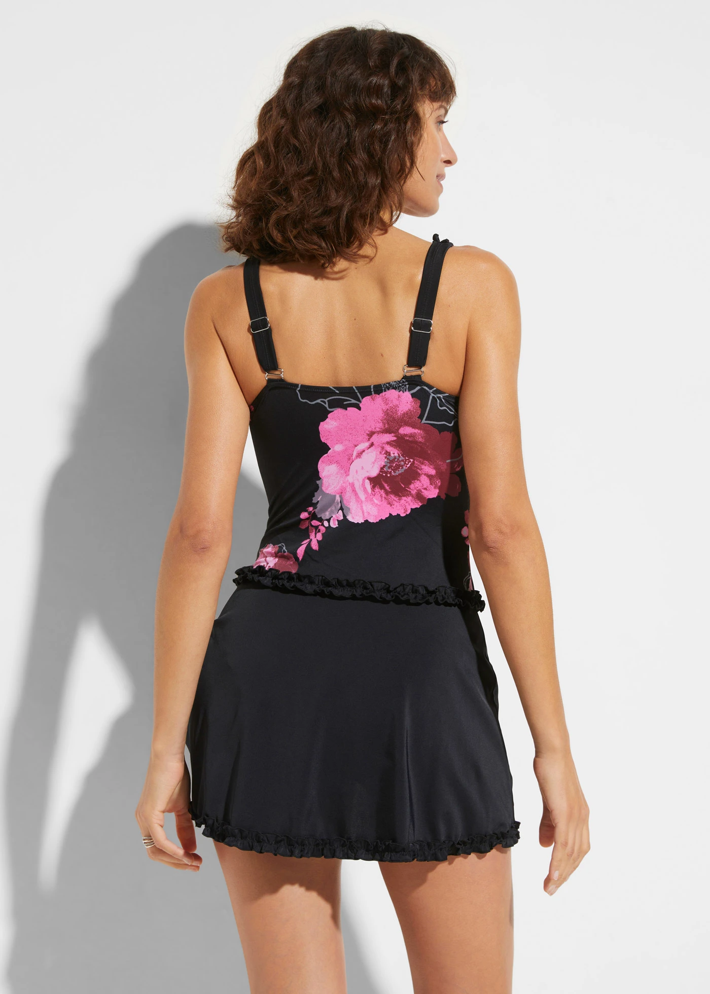 Stahovací koupací šaty se střední tvarovací funkcí • černo-pink s květy • bonprix obchod