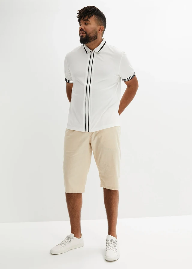 Polo zippé en maille piquée 100% coton, Couleur: blanc + noir