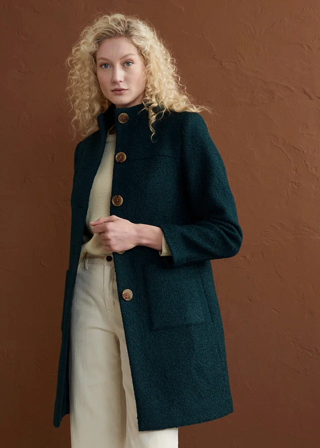 Lange bouclé jas met zakken • petrolgroen • product-page.page-title-suffix