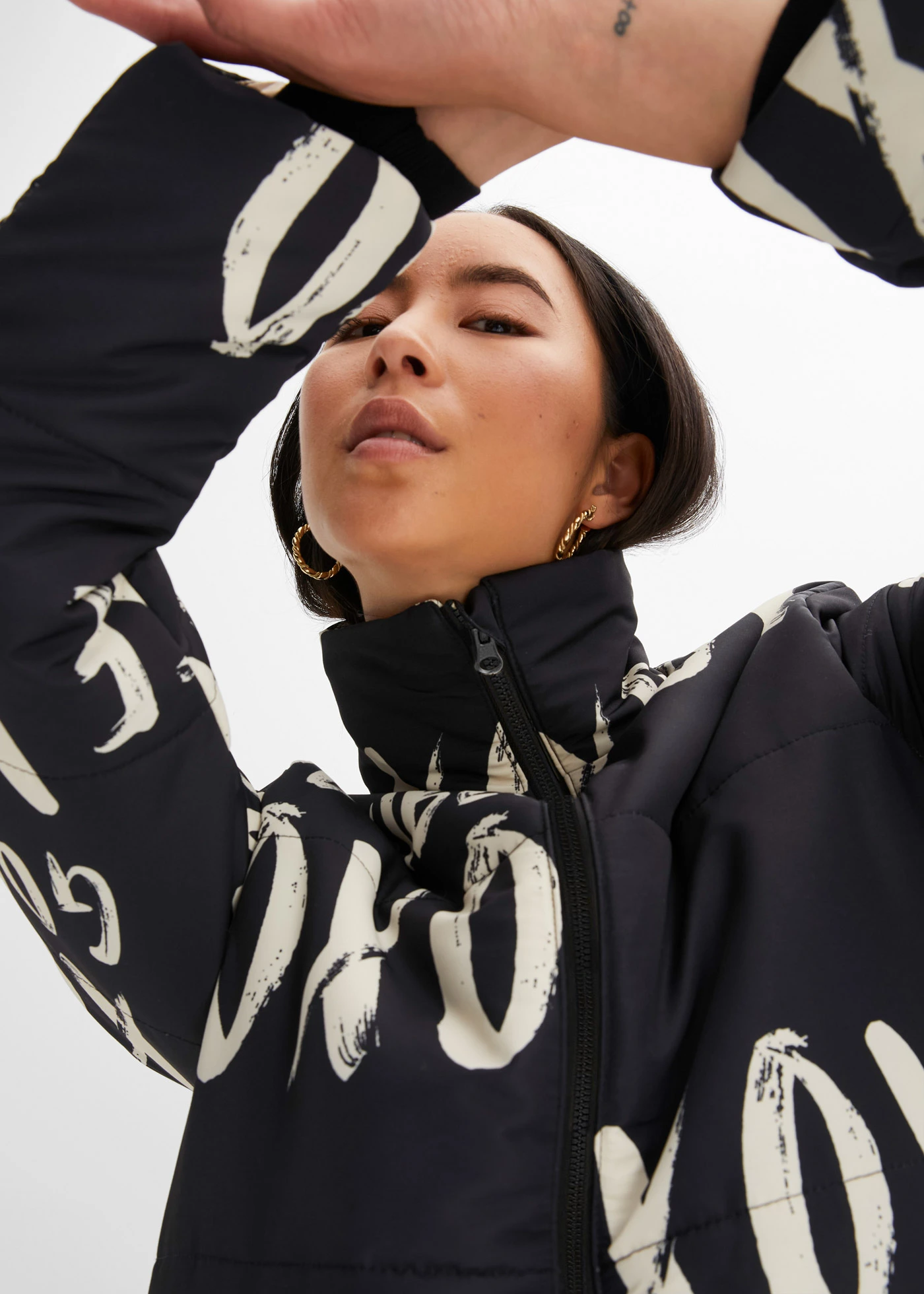 Manteau matelassé imprimé • noir-naturel imprimé • Boutique bonprix