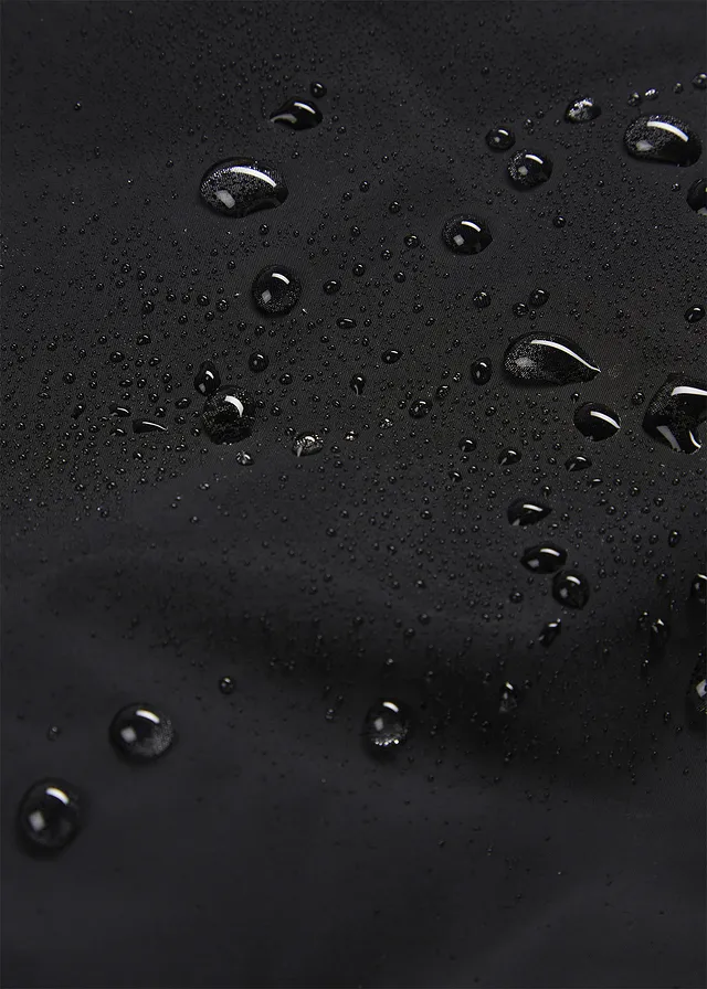 Waterdichte, lange regenjas in midilengte • zwart • product-page.page-title-suffix