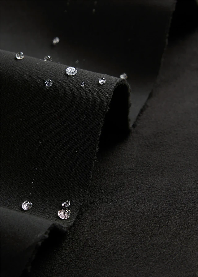 Veste déperlante en softshell • noir • product-page.page-title-suffix