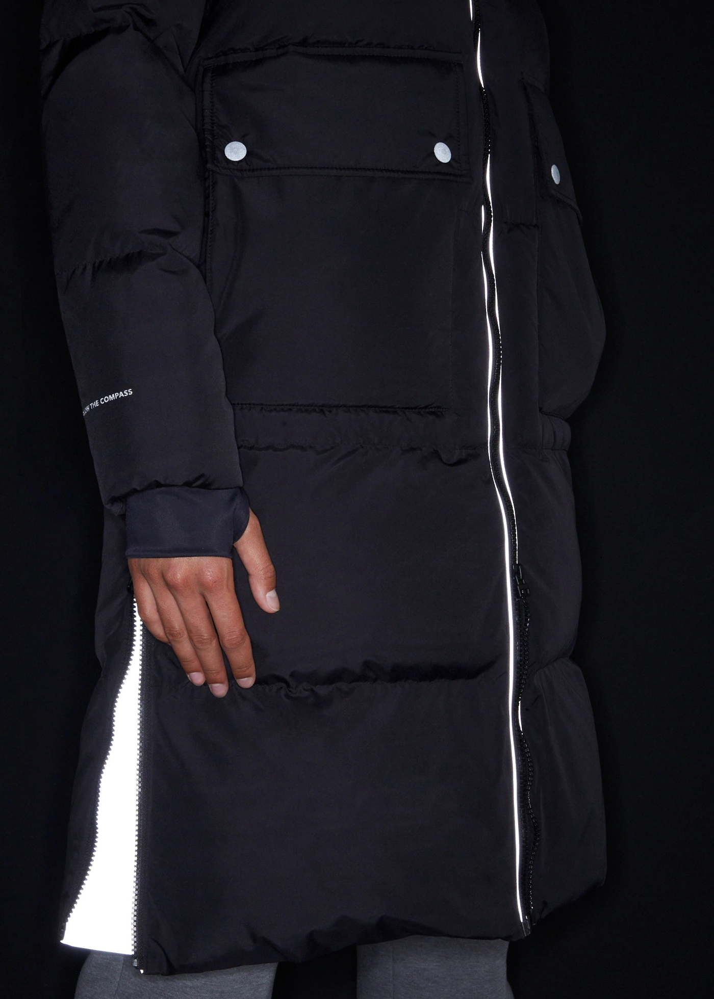 Lange waterafstotende donsjas met reflecterende details • zwart • bonprix online shop