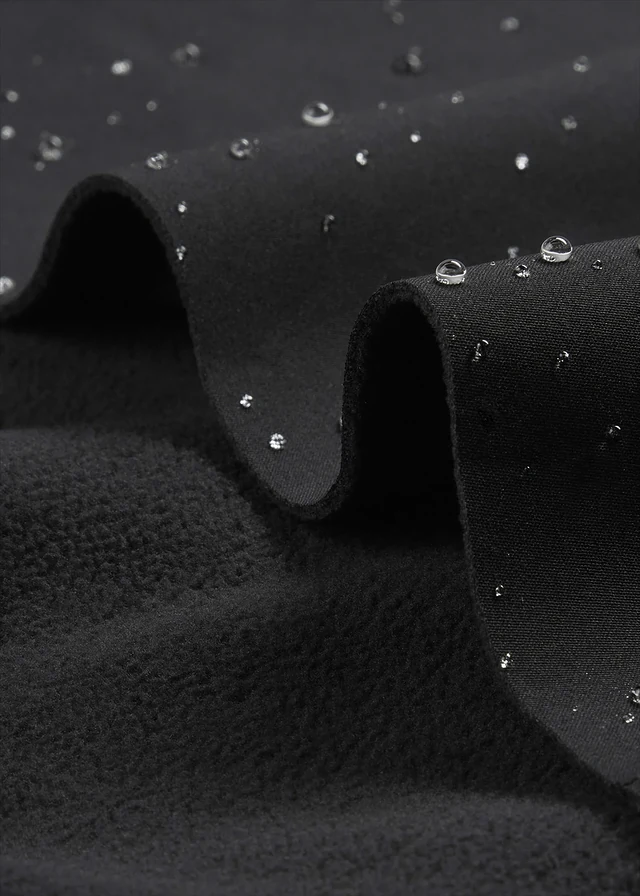 Pantalon technique en softshell extensible et déperlant • noir • product-page.page-title-suffix
