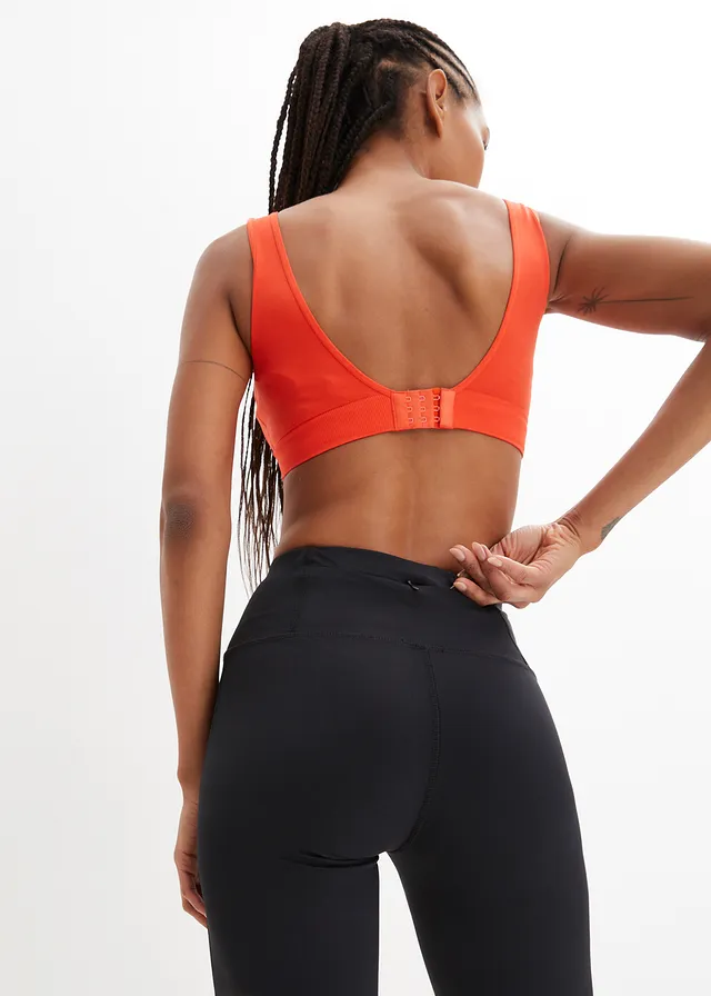 Pantalon de sport sculptant avec poche, jambes évasées • noir • product-page.page-title-suffix