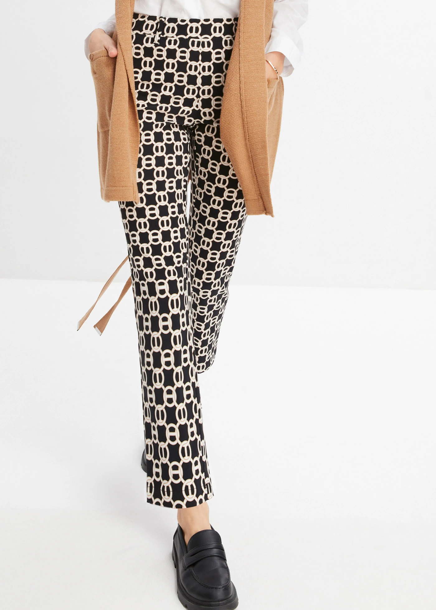 Stretch broek • zwart-wolwit met grafische print • bonprix online shop