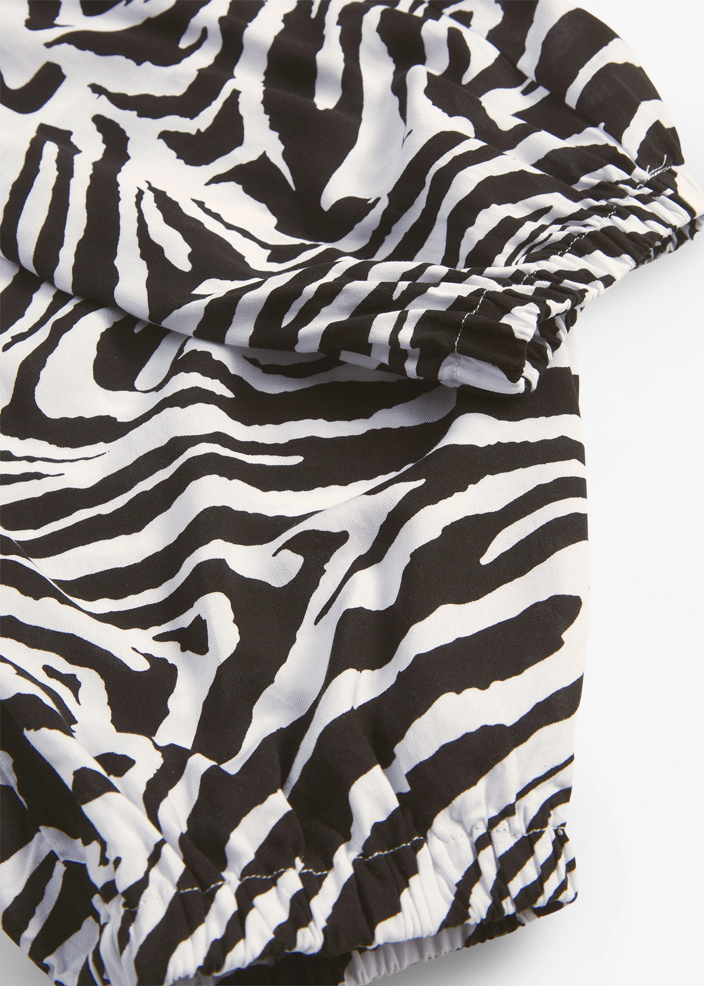 Nohavice palazzo z padavej viskózy • čierna zebrovaná potlačená • obchod bonprix