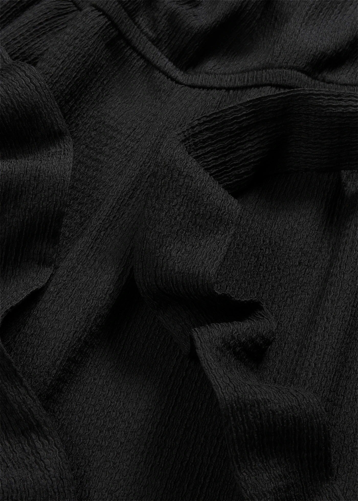 Jersey jumpsuit van gestructureerde crêpe • zwart • bonprix online shop