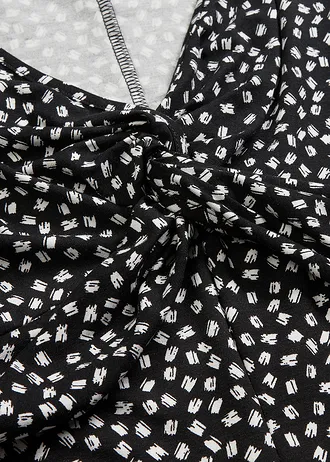 Rochie de jerse drapată, din amestec moale de viscoză • negru-alb, cu imprimeu grafic • magazin bonprix