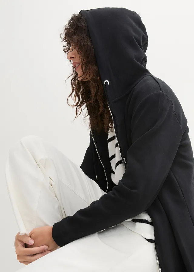 Lang sweatvest met ritszakken • zwart • product-page.page-title-suffix