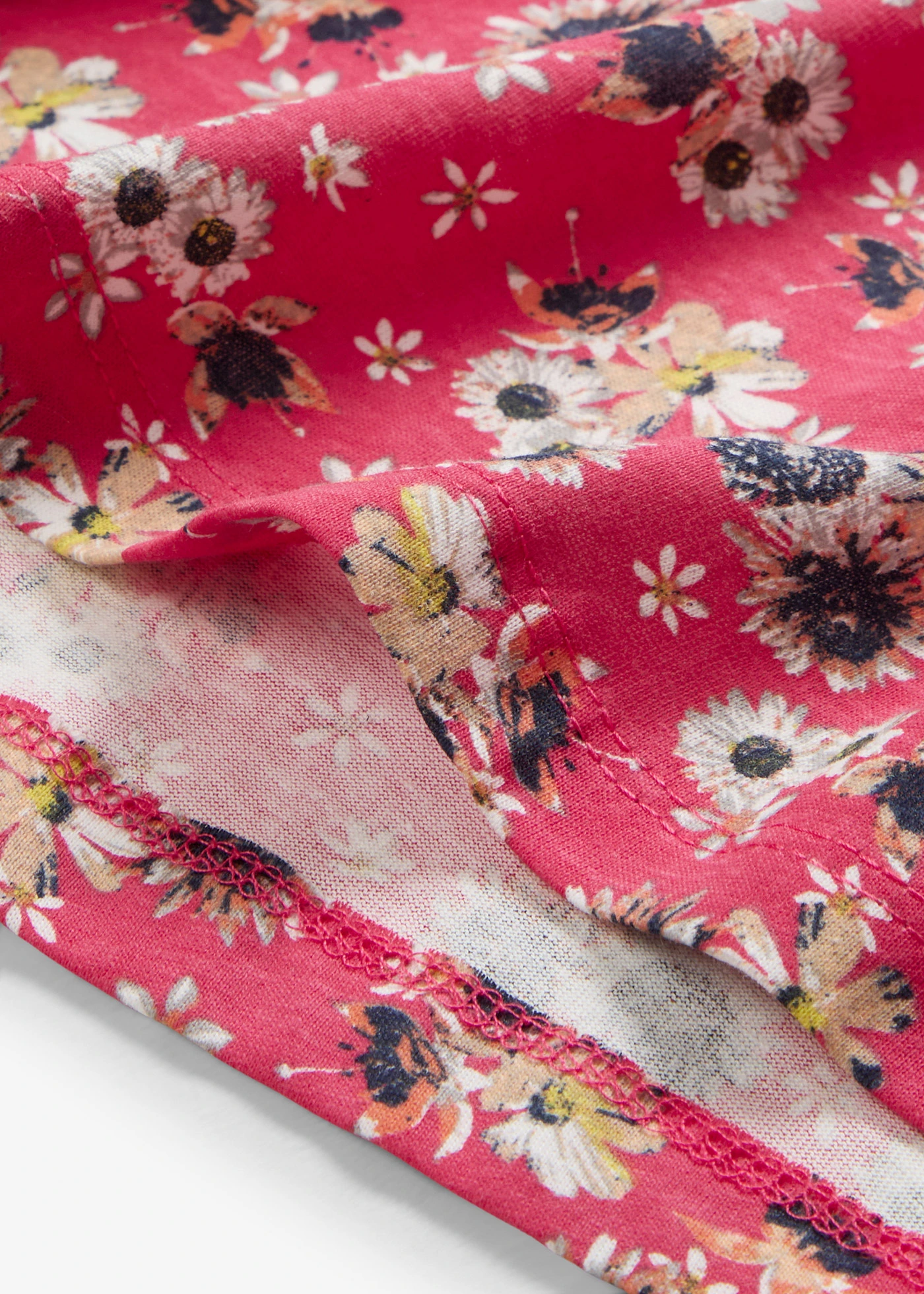 Úpletové šaty s postranními rozparky, z čisté bavlny (2 ks) • ibišková pink s květy + černá • bonprix obchod