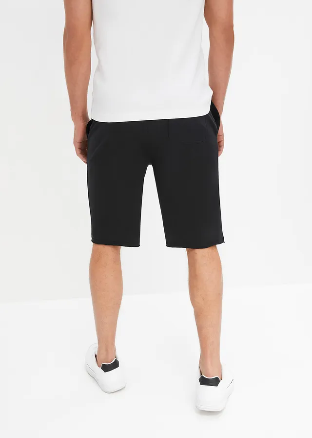 Bermuda sweat à bordures ouvertes en coton, Loose Fit • noir • product-page.page-title-suffix