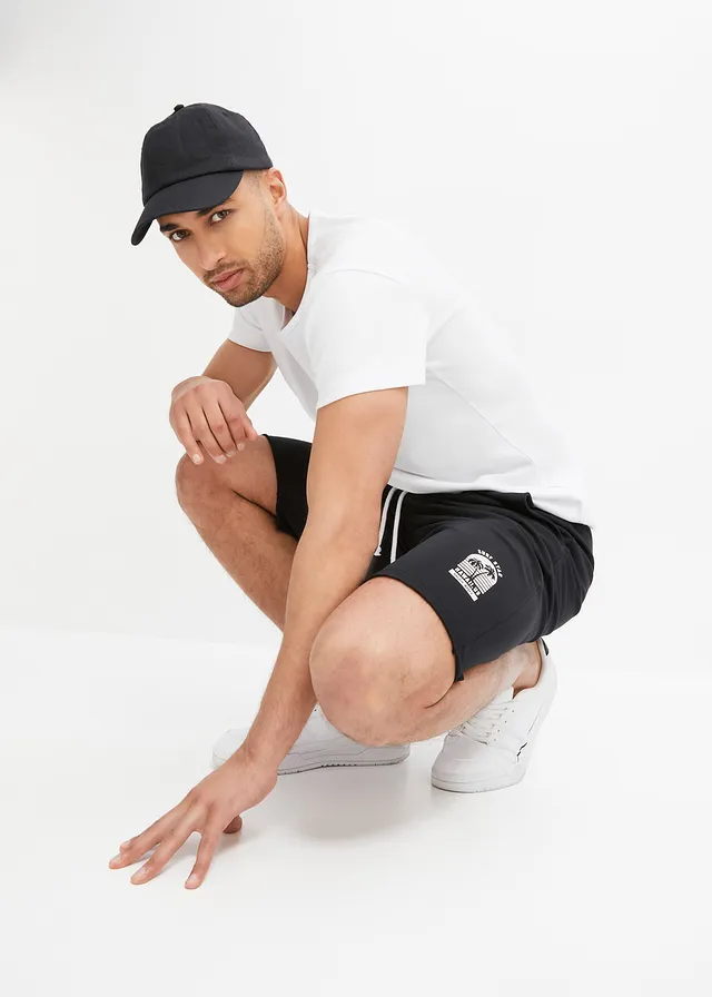 Bermuda sweat à bordures ouvertes en coton, Loose Fit • noir • product-page.page-title-suffix