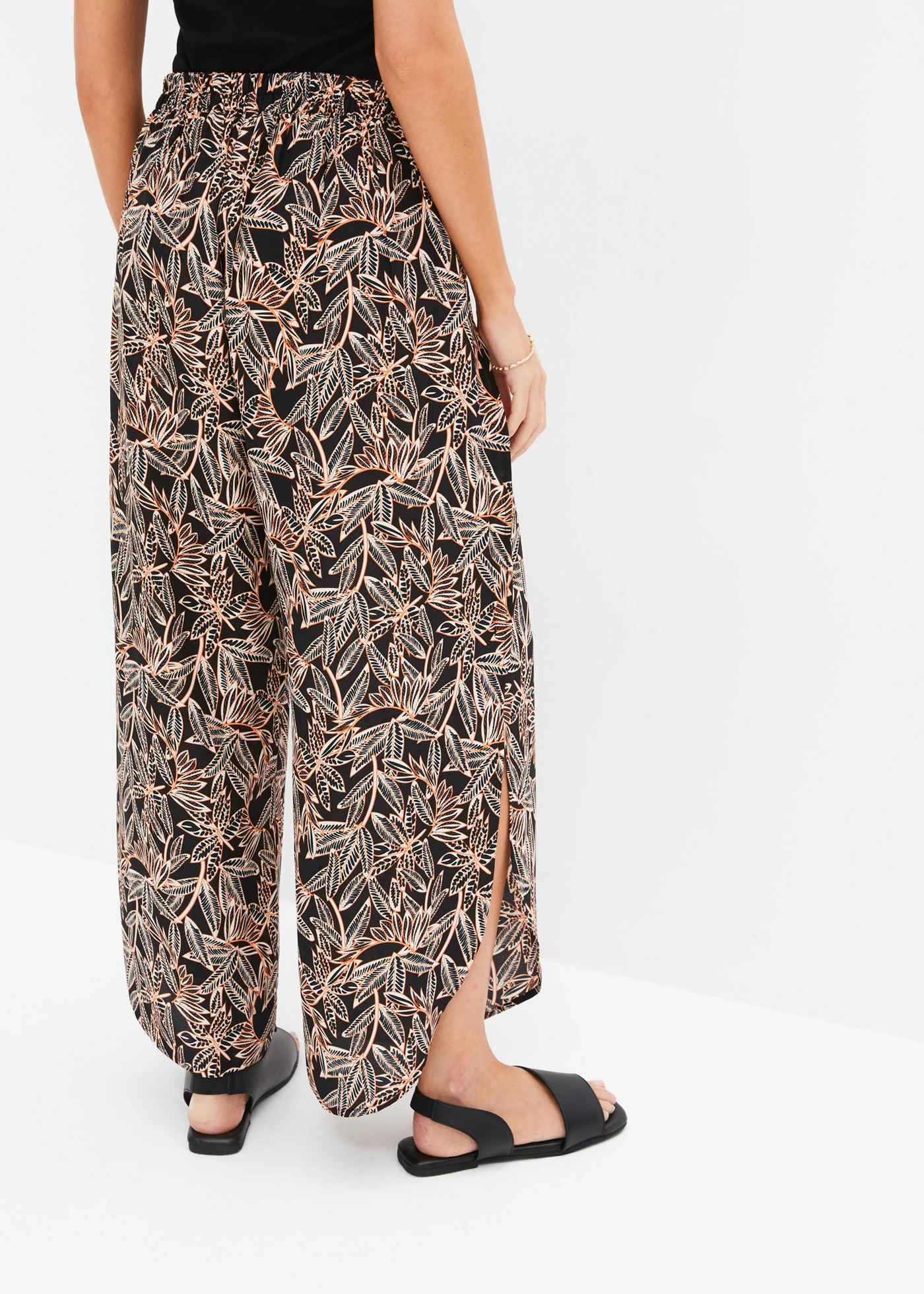 Pantalon palazzo fendu en bas • noir/orange/écru imprimé • Boutique bonprix