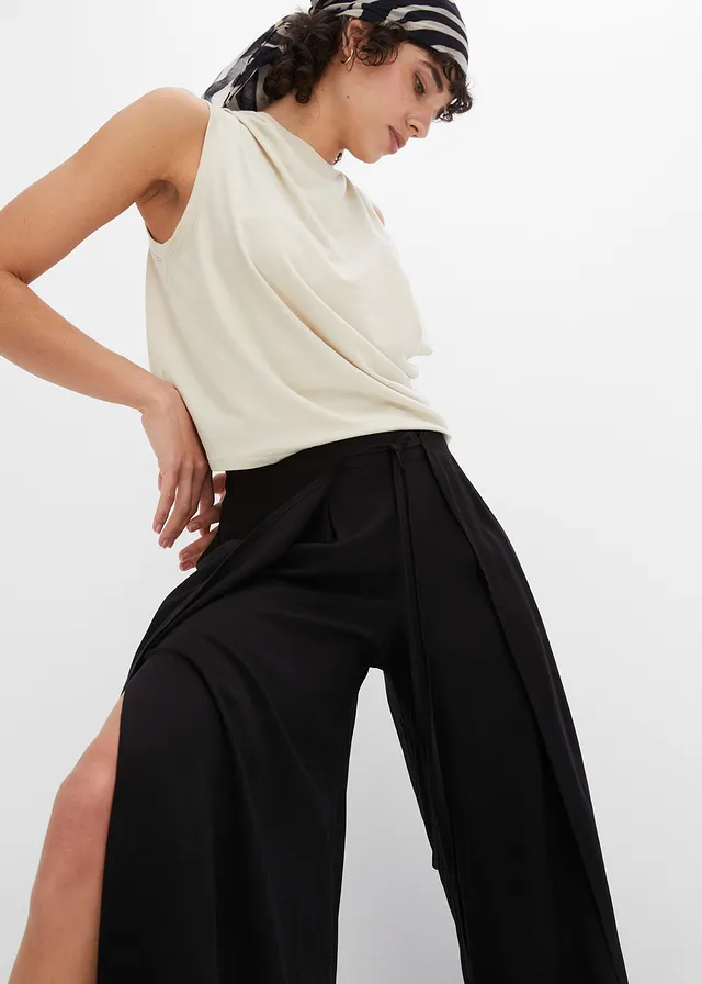 Viscose broek met splitten • zwart • product-page.page-title-suffix