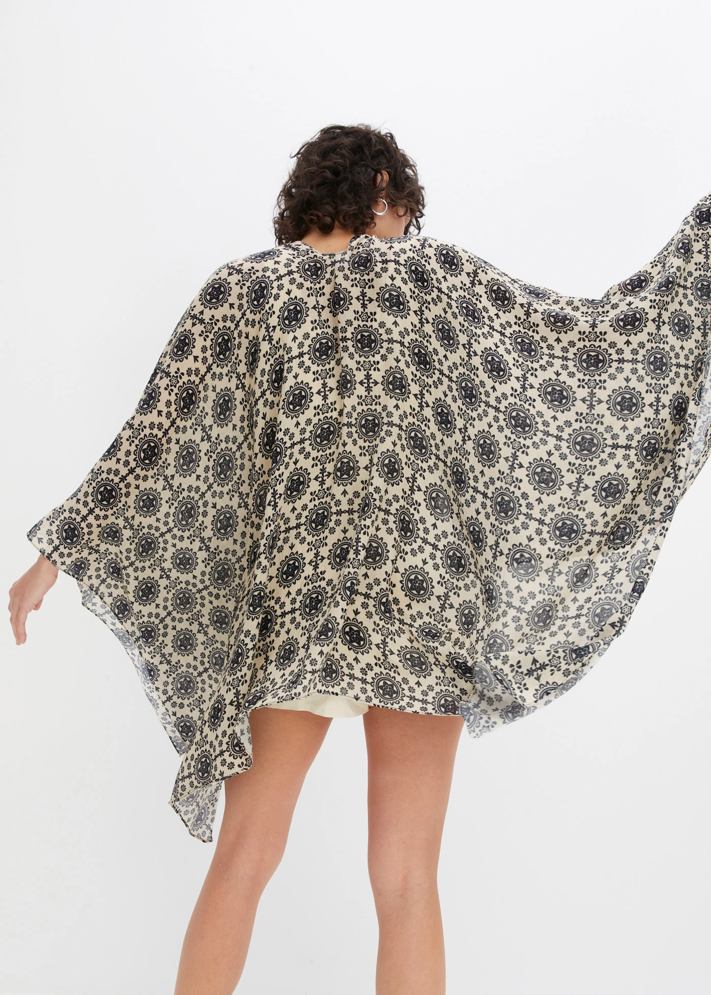 Poncho • zwart-crème gedessineerd • bonprix online shop