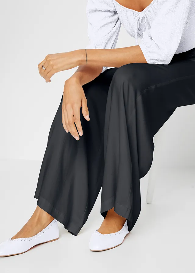 Pantalon fluide en viscose légèrement brillante • noir • product-page.page-title-suffix