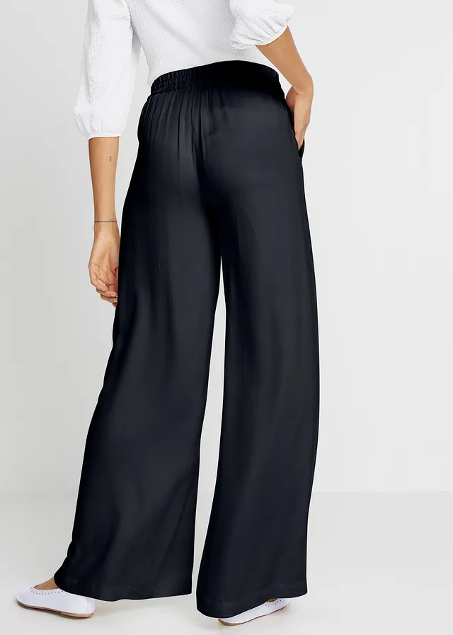 Pantalon fluide en viscose légèrement brillante • noir • product-page.page-title-suffix