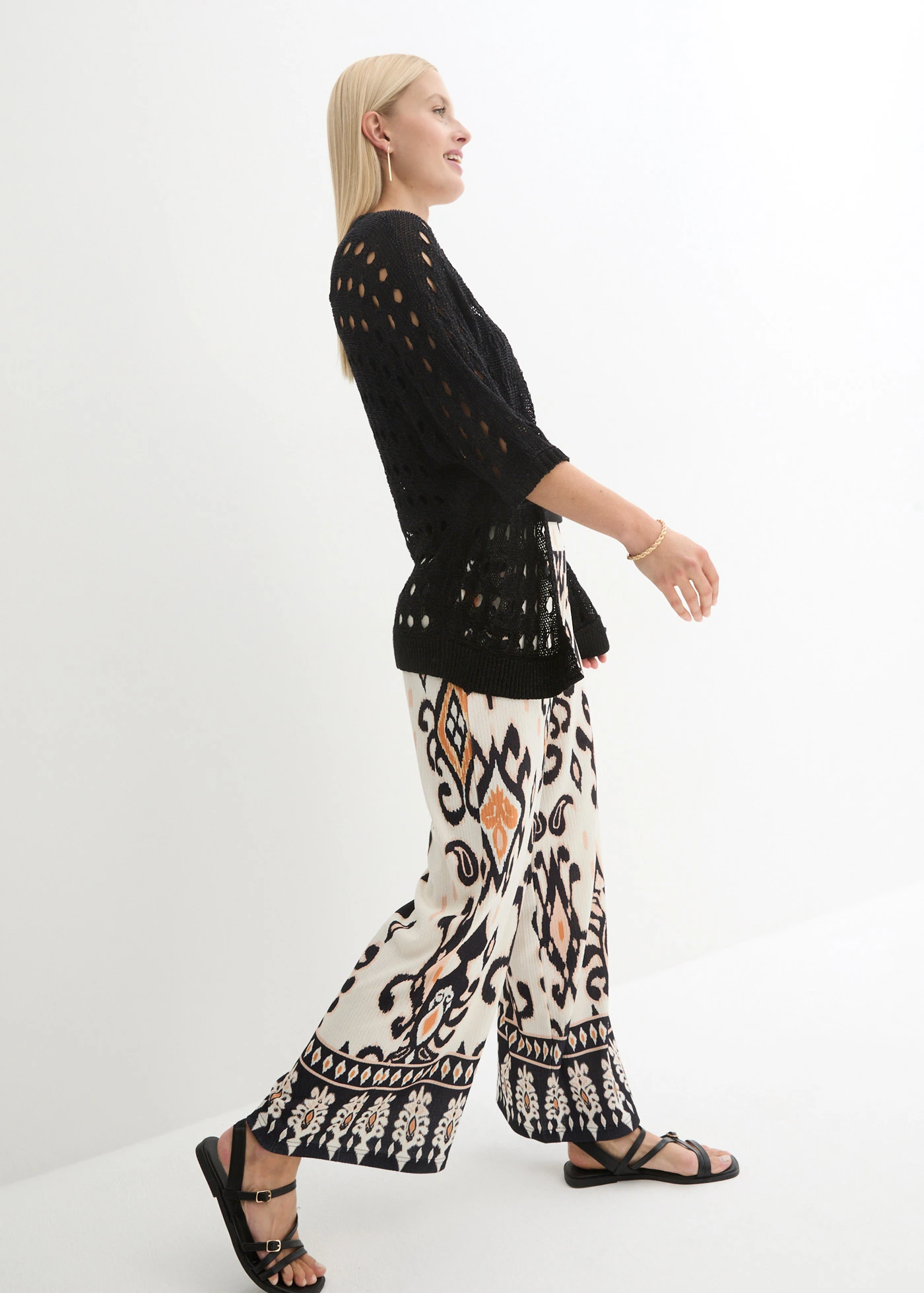 Ažurový pletený kabátek s třpytivou přízí • černá • bonprix obchod