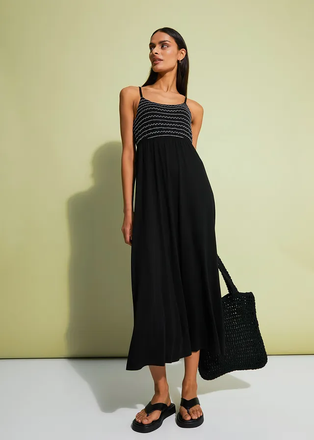 Midi jurk met borduursel • zwart • product-page.page-title-suffix