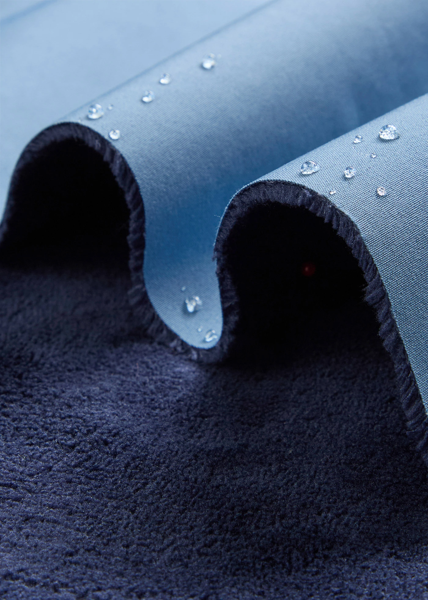 Funkční softshellová dlouhá bunda s plyšovým flísem, vodoodpudivá • džínově modrá • bonprix obchod