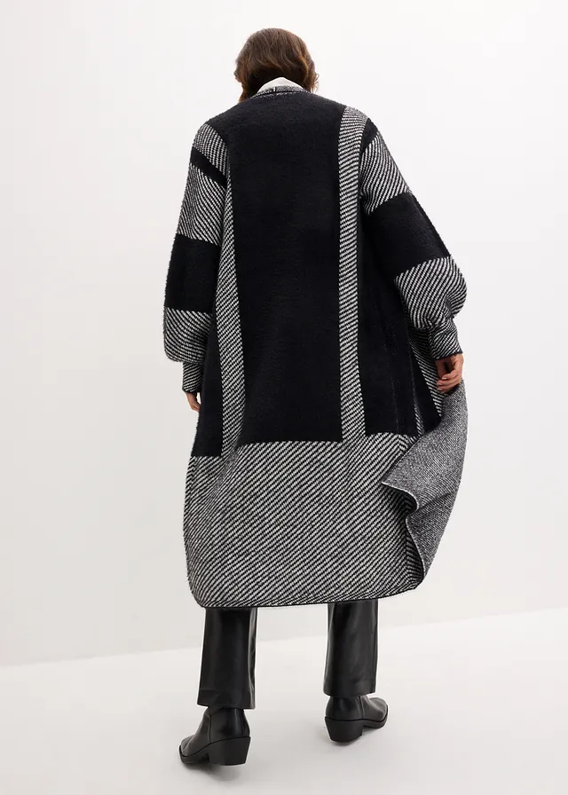 Lang gebreid vest • zwart/wolwit • product-page.page-title-suffix