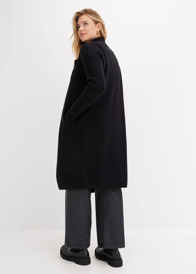 Lang gebreid vest • zwart • product-page.page-title-suffix