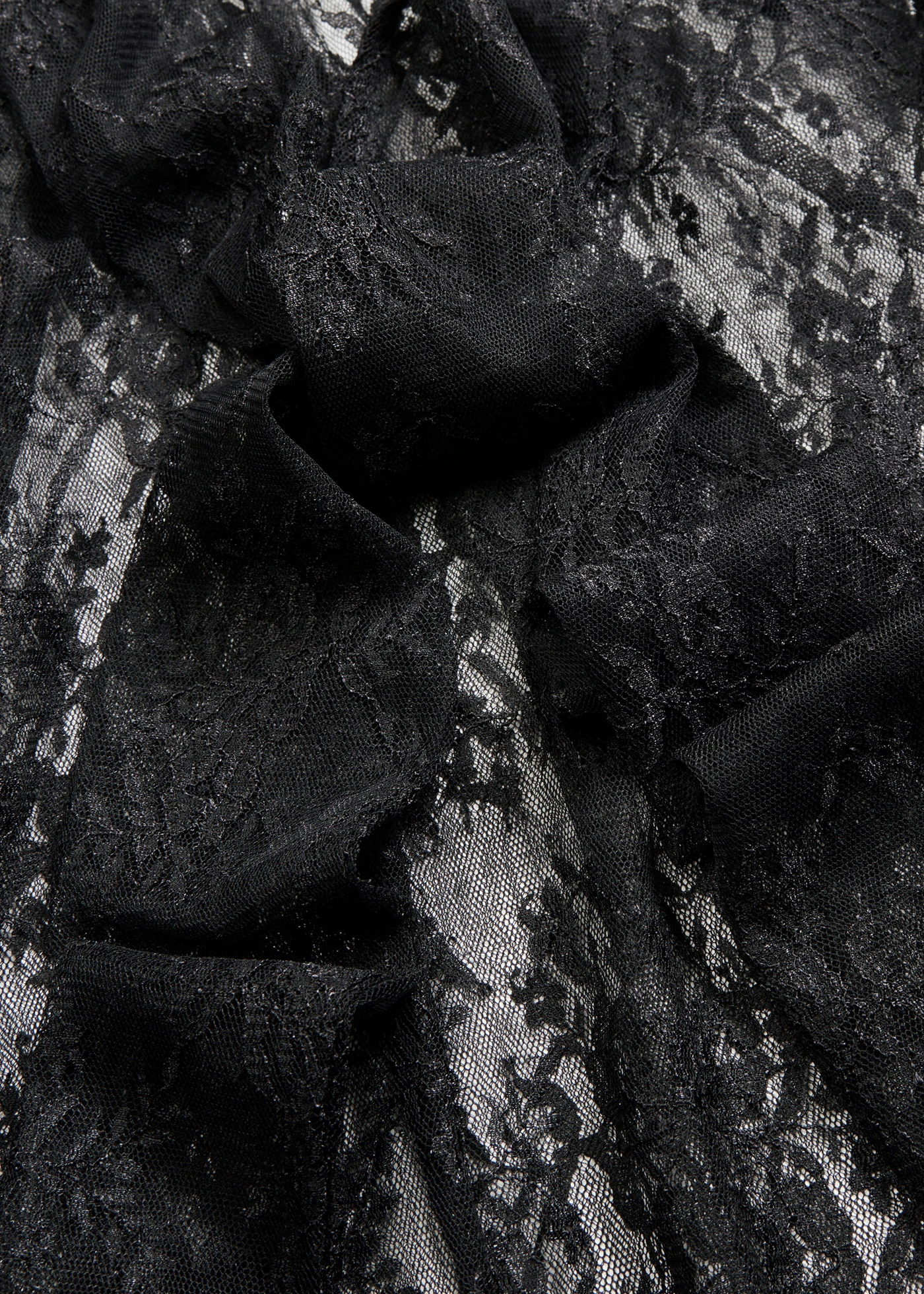 Blouse en dentelle légèrement transparente • noir • Boutique bonprix