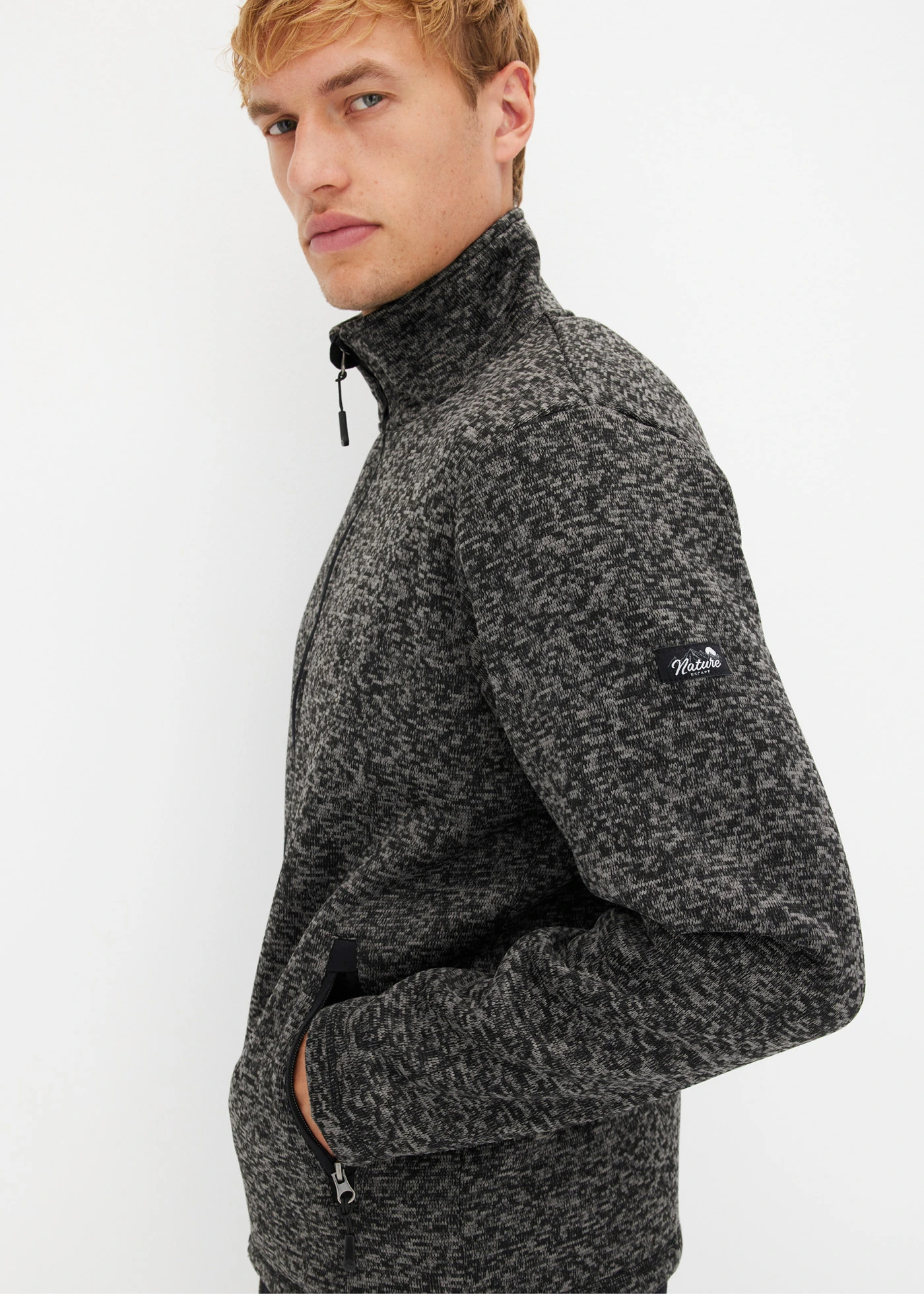 Jachetă fleece cu aspect tricotat și căptușeală teddy • gri fumuriu-negru melanj • magazin bonprix