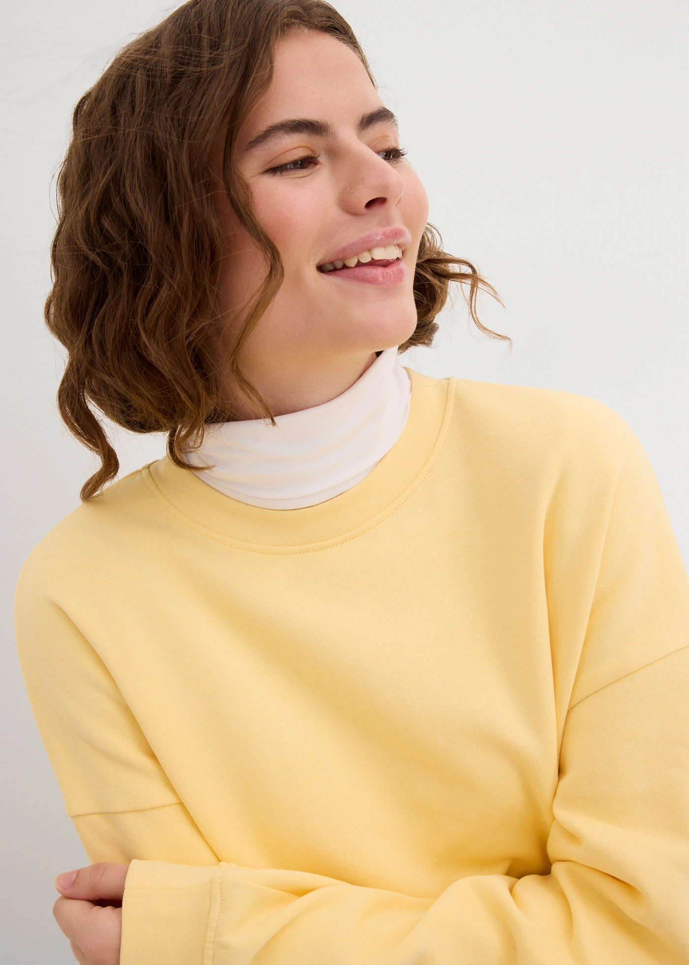 Oversized sweater van puur katoen • crèmegeel • bonprix online shop