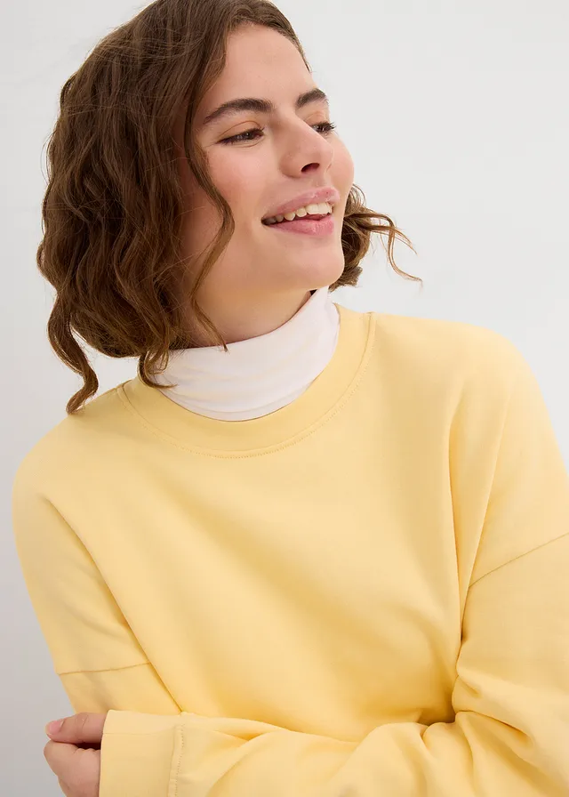 Oversized sweater van puur katoen • crèmegeel • product-page.page-title-suffix