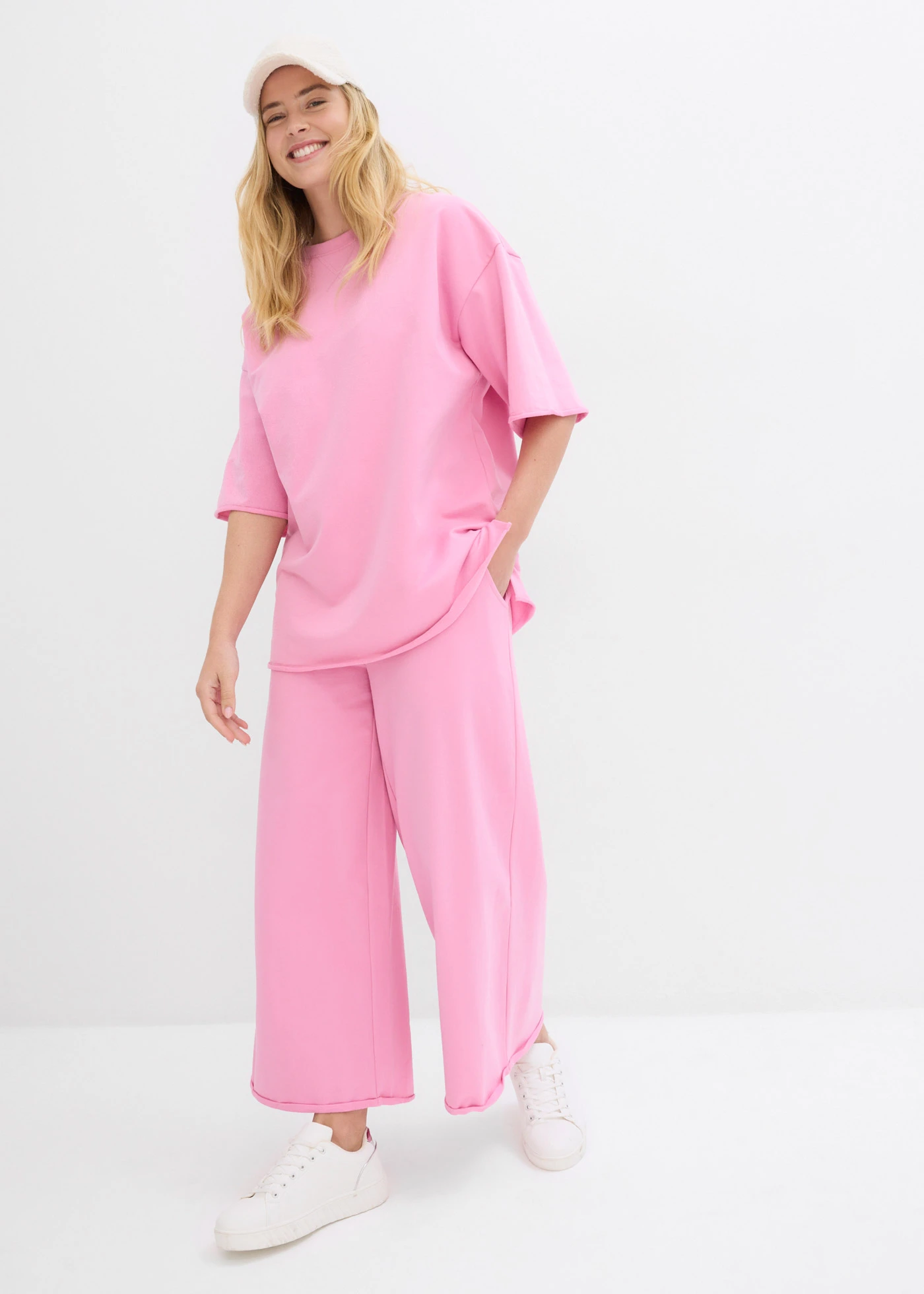 Bő szabadidőnadrág bio-pamutból, 7/8-os hosszban • virágpink • bonprix áruház