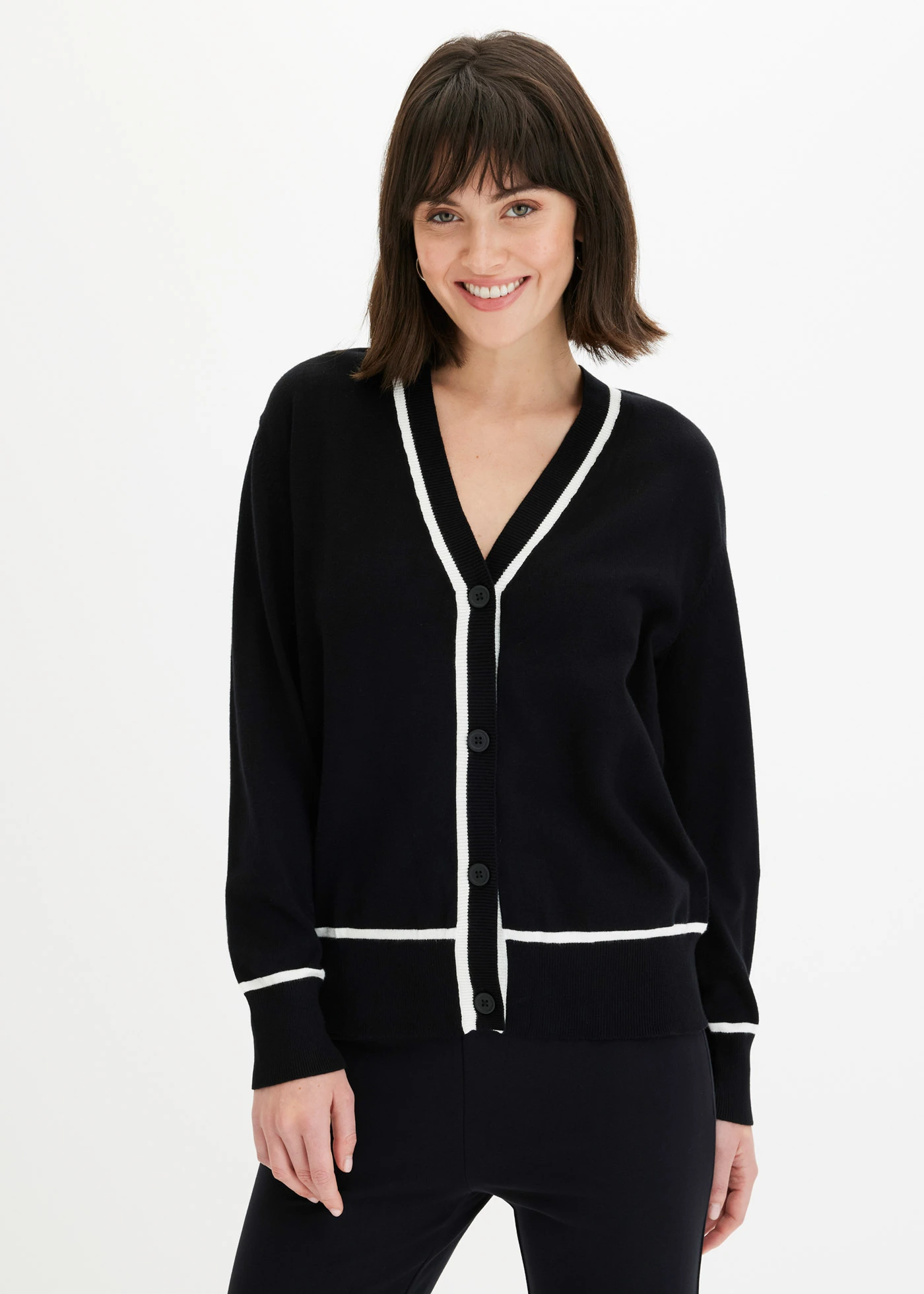 Cardigan met V-hals • zwart/wolwit • bonprix online shop