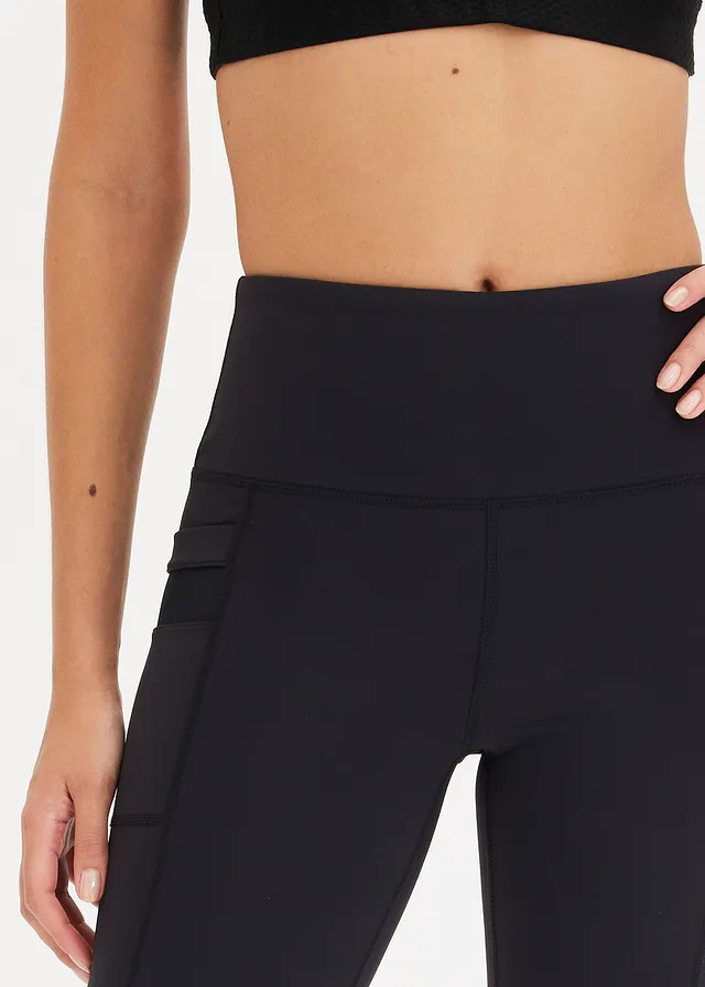 Comfort sportlegging met mesh en telefoonzak • zwart • product-page.page-title-suffix