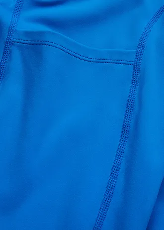 Komfort sport legging mobiltelefonos zsebbel és lefelé bővülő szárral, gyorsan szárad • horizont kék • bonprix áruház