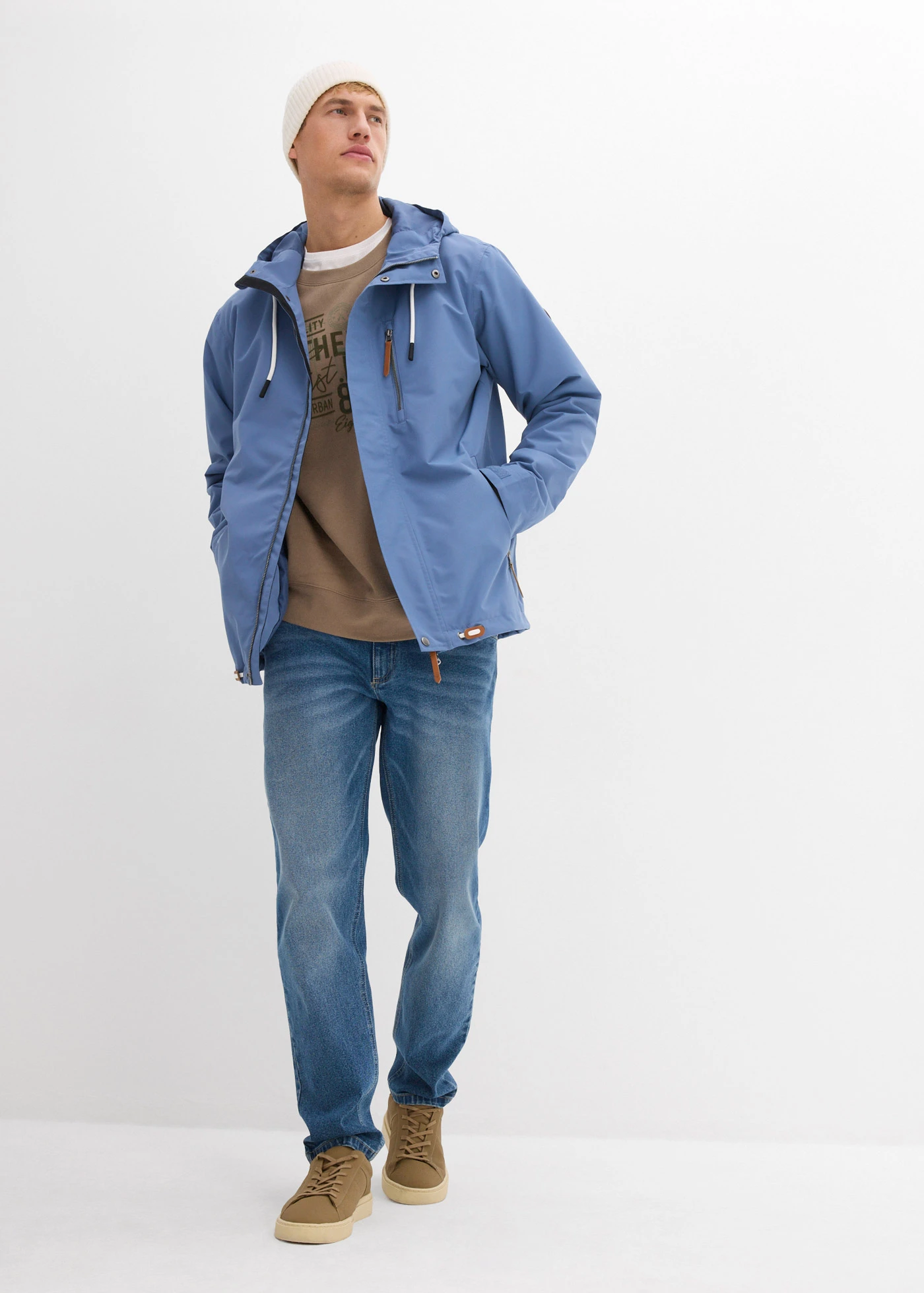 Veste imperméable à capuche et détails enduits • bleu jean • Boutique bonprix