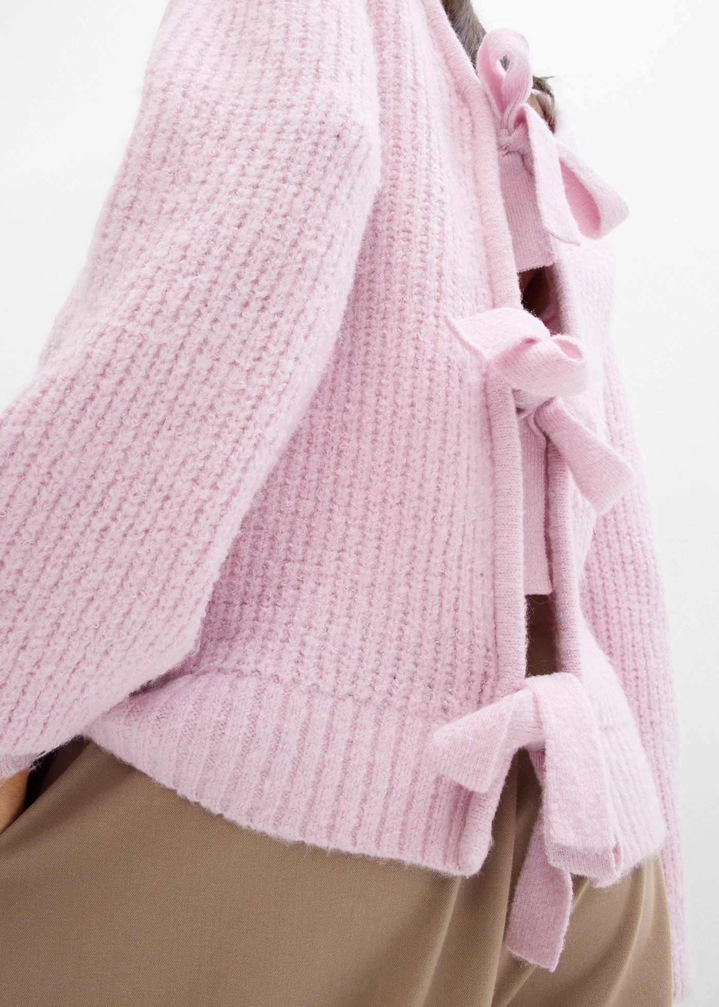 Oboustranný pletený kabátek s mašličkami • pudrově šeříková • bonprix obchod