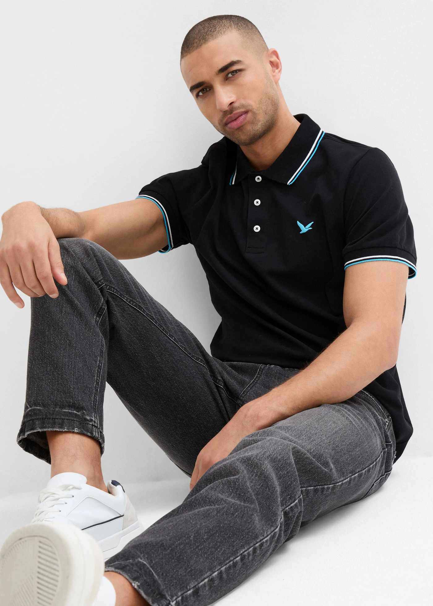 Piqué poloshirt van puur katoen • zwart/turkoois • bonprix online shop