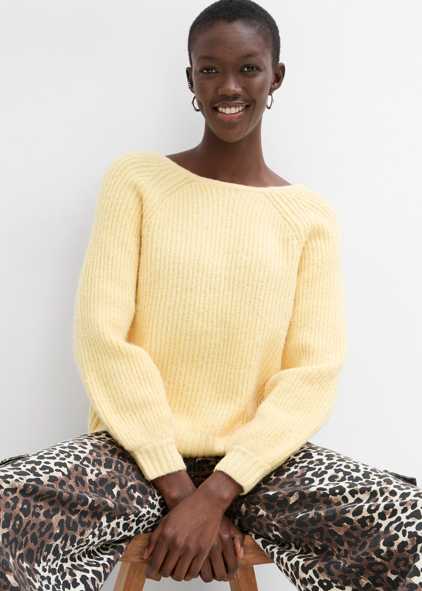 Oboustranný pletený kabátek s mašličkami • světle žlutá • bonprix obchod